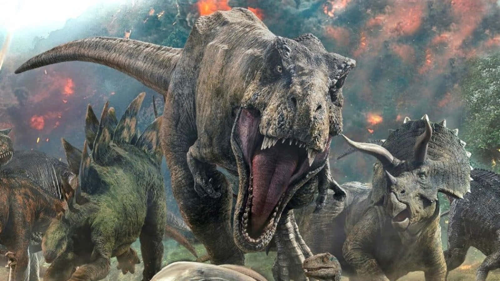 Jurassic World 桌布 壁紙 — 一頭咆哮的暴龍在熾熱爆炸和煙霧中，與劍龍和三角龍一起主宰著混亂的史前戰場。