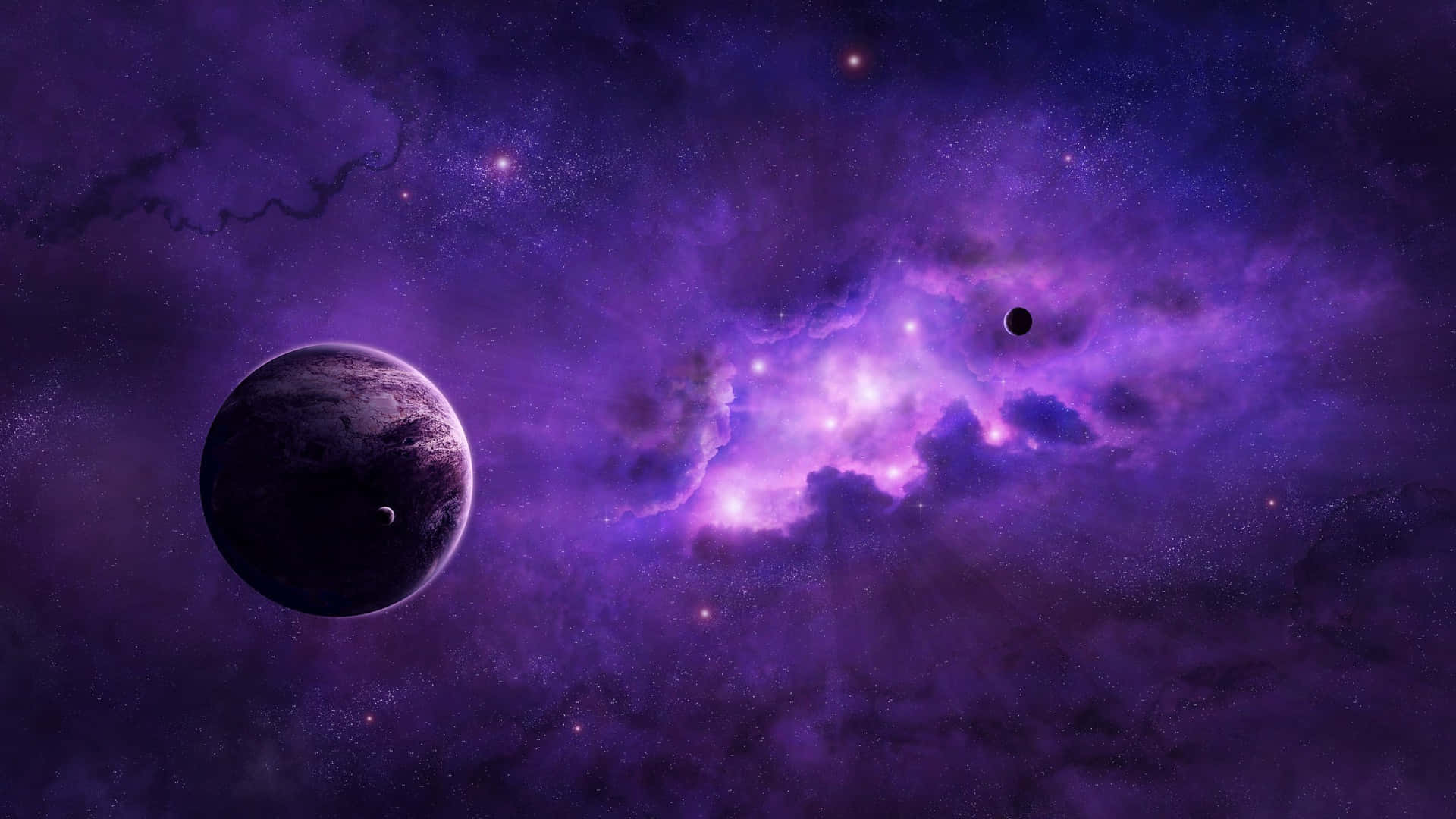 紫色銀河 桌布 壁紙 — 一顆帶有光環的黑暗行星漂浮在充滿恆星的發光紫色星雲附近，位於深空中。