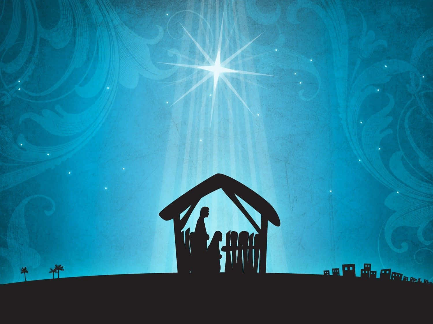 Nativity 桌布 壁紙 — 一顆閃耀的星星照耀著剪影的耶穌誕生場景，背景是旋轉的藍色天空。