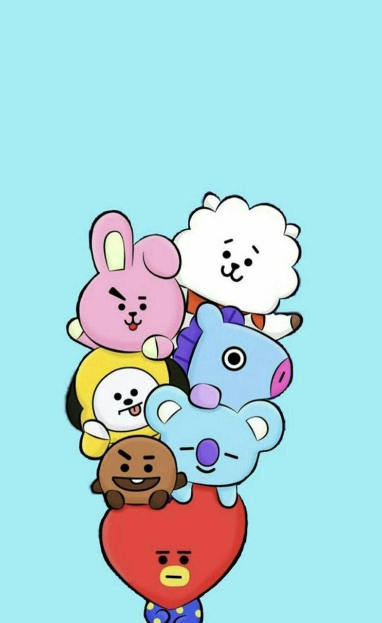 BT21 桌布 壁紙 — 七個色彩繽紛的BT21卡通人物堆疊在一個紅色心形上，背景為淺藍色。