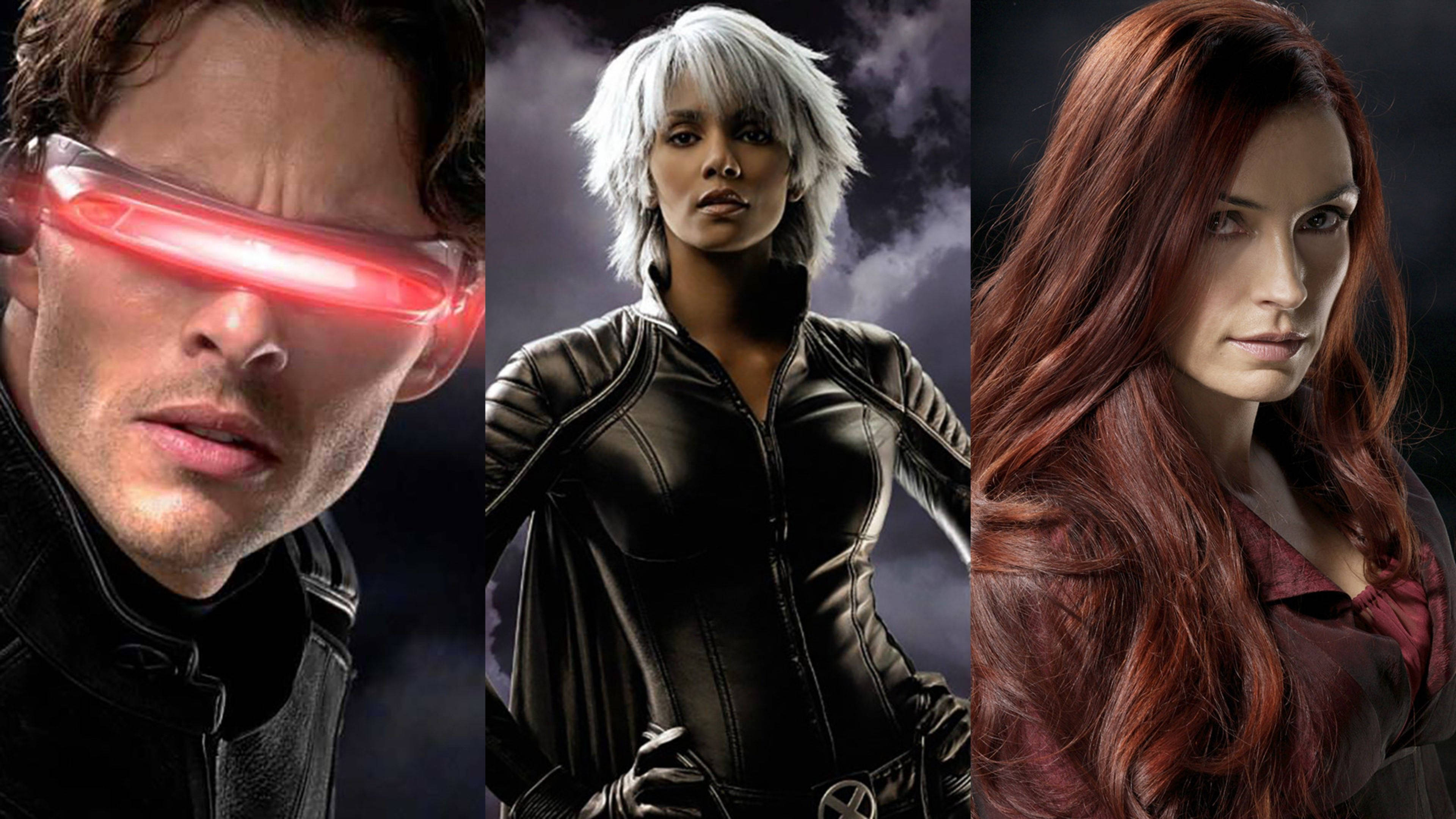 X Men Movie Cyclops, Storm, Jean Grey 壁紙 — 三個X-Men角色在戲劇性的特寫中，表情強烈，紅色護目鏡發光，背景陰暗風暴。