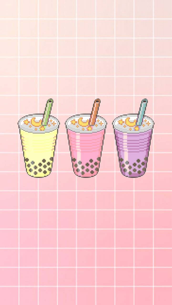 Boba 桌布 壁紙 — 三個像素風格的珍珠奶茶杯，顏色為粉彩黃、粉紅和紫色，放置在柔和的粉紅色網格背景上。