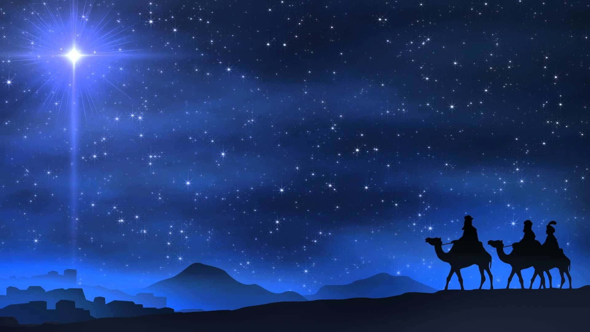 Nativity 桌布 壁紙 — 三個剪影人物騎著駱駝穿越沙漠，在繁星點點的夜空下，一顆明亮的引導星主導著畫面。