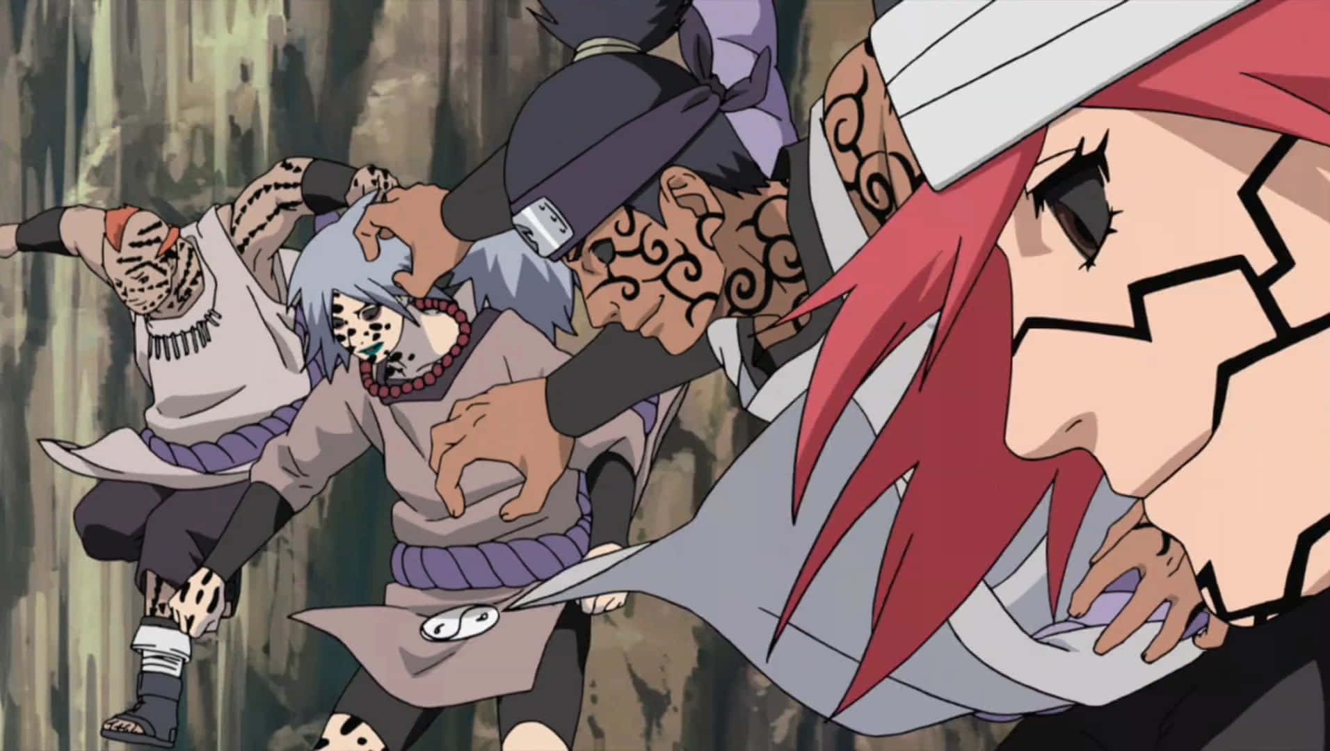 Kidomaru 桌布 壁紙 — 三個動漫忍者角色以動態戰鬥姿勢，帶有紋身和頭帶，背景為岩石。
