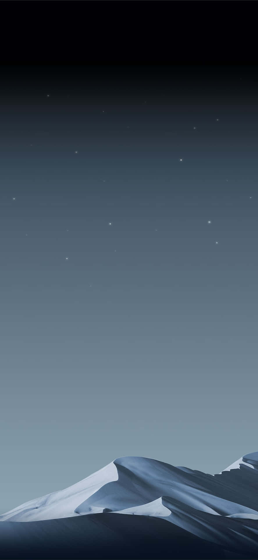積雪的山峰在繁星點點的夜空下，帶有藍色漸變。