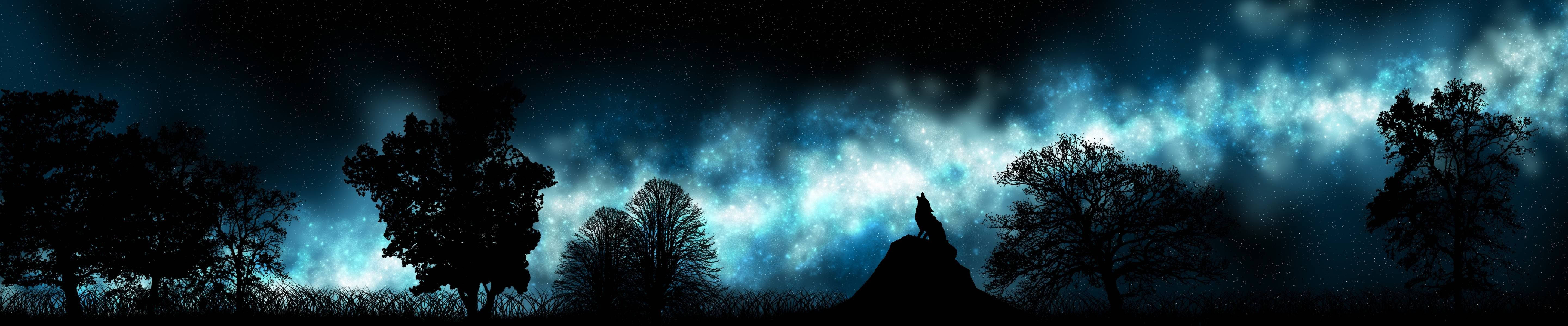 一個人在星空宇宙天空下的山丘上站立的剪影。