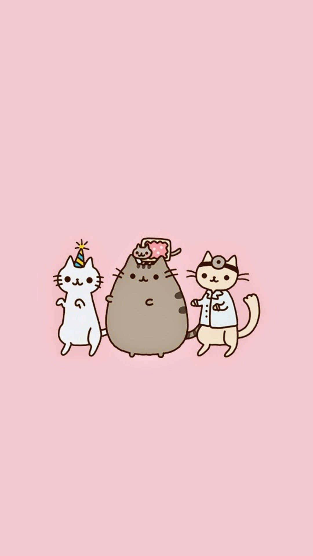 Pusheen 桌布 壁紙 — 三隻可愛的卡通貓咪在柔和的粉紅色背景前，戴著派對帽、醫生帽，蛋糕上還有一隻小貓咪，正在慶祝派對。