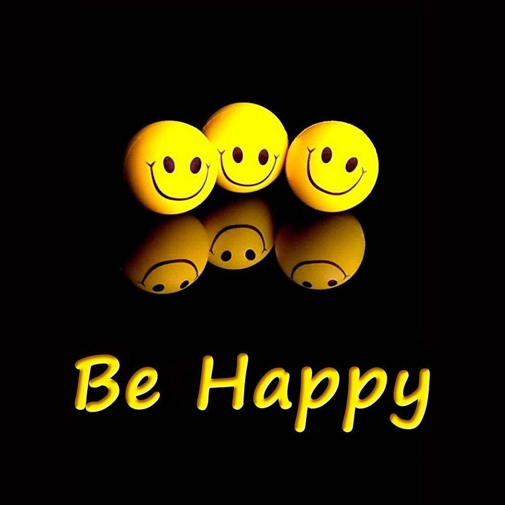三個發光的黃色笑臉波波，帶有反射和「Be Happy」文字。
