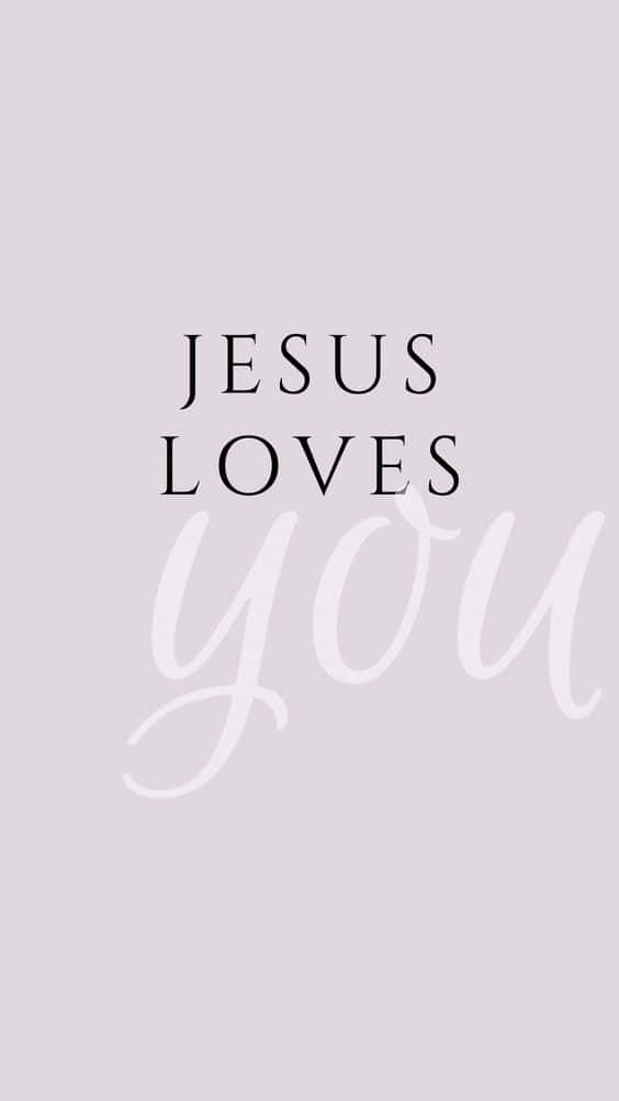 文字桌布，在薰衣草背景上以黑白顯示 'JESUS LOVES you'。