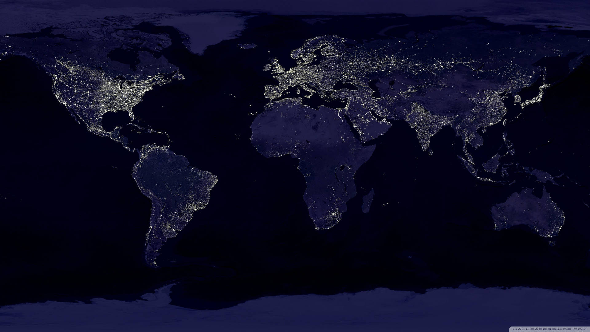 地球夜間衛星圖像，顯示明亮的城市和黑暗的海洋。