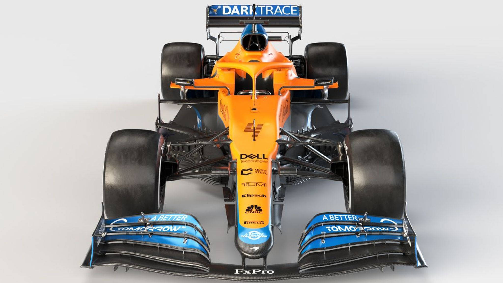丹尼爾·里卡多F1賽車數位藝術 壁紙 — 從上方俯瞰一輛橙色和藍色的 Formula 1 賽車，帶有贊助商標誌，背景為純白色。