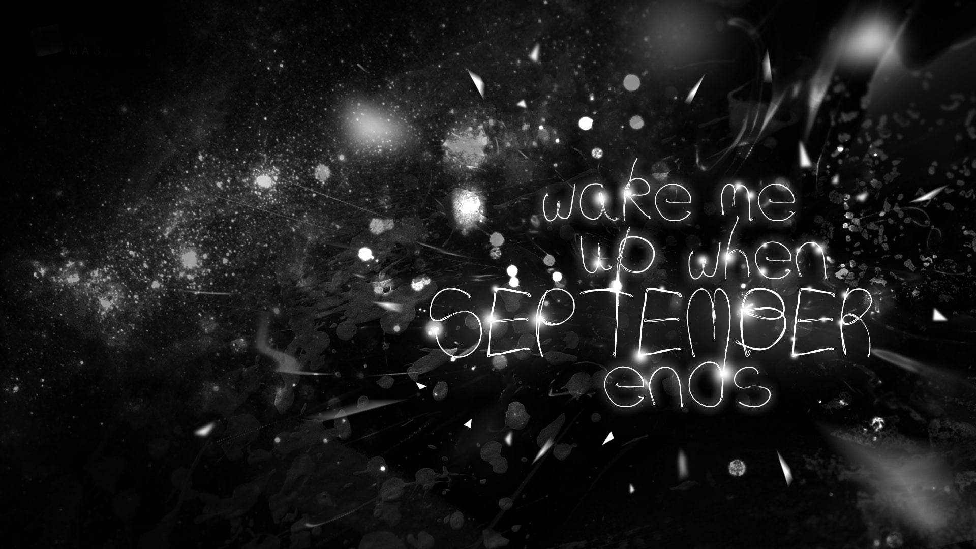 發光文字寫著 wake me up when september ends，在深色背景上閃爍