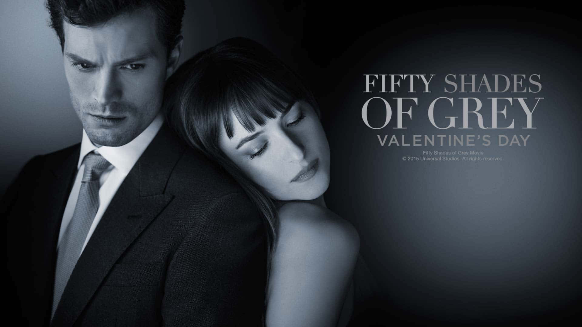 一男一女緊密擁抱，附有文字 Fifty Shades of Grey 情人節。