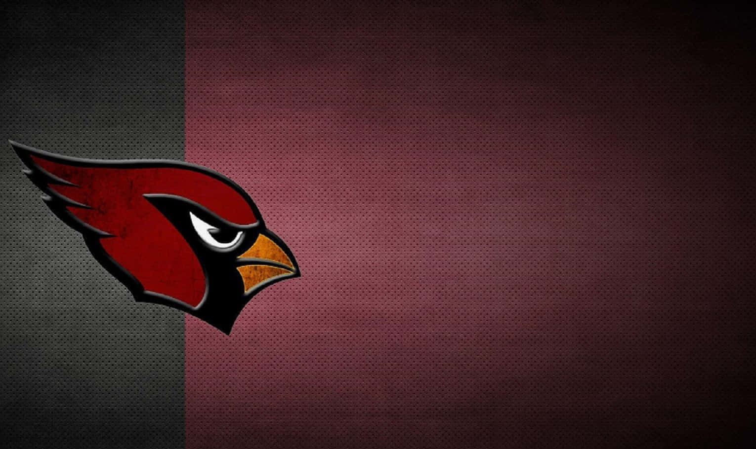 亞利桑那紅雀隊NFL球隊標誌在深色紋理背景上。