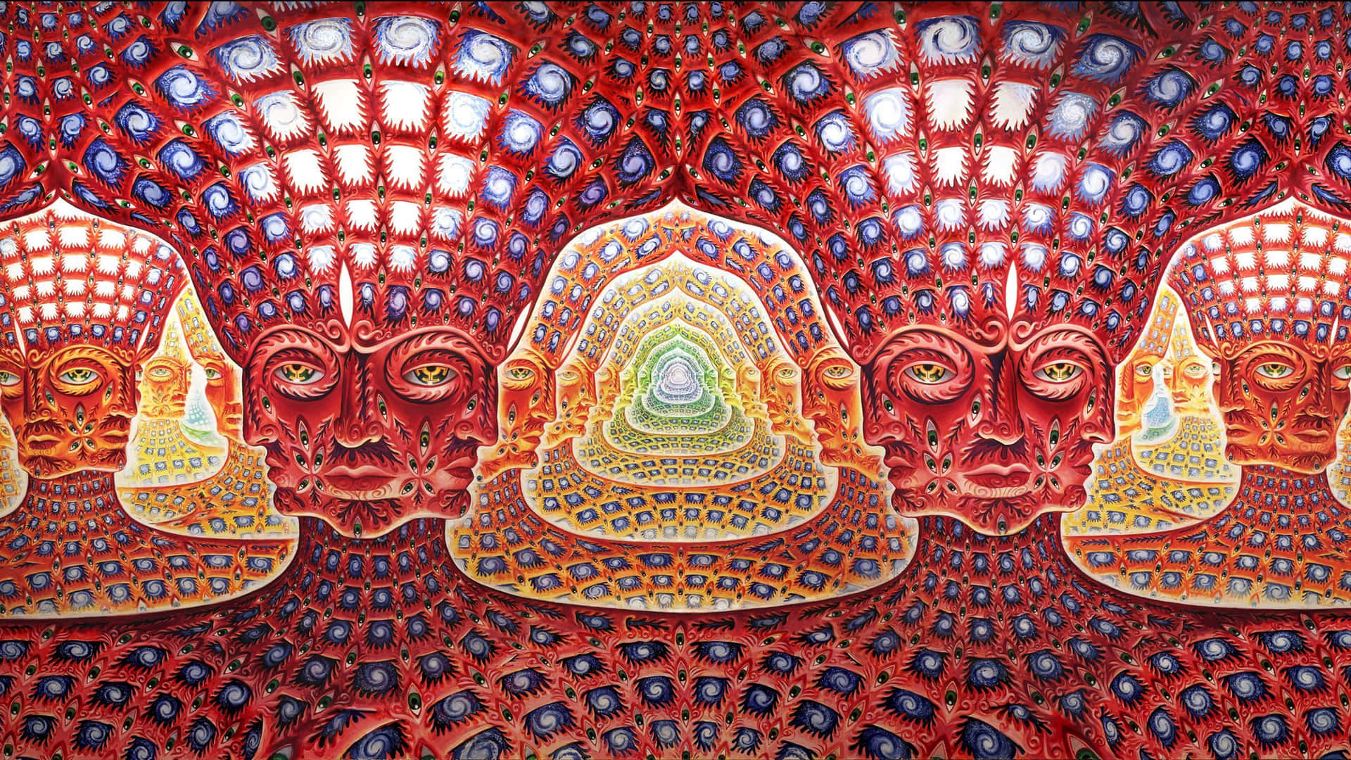 對稱的紅色面孔，帶有複雜的圖案和中央螺旋曼陀羅。