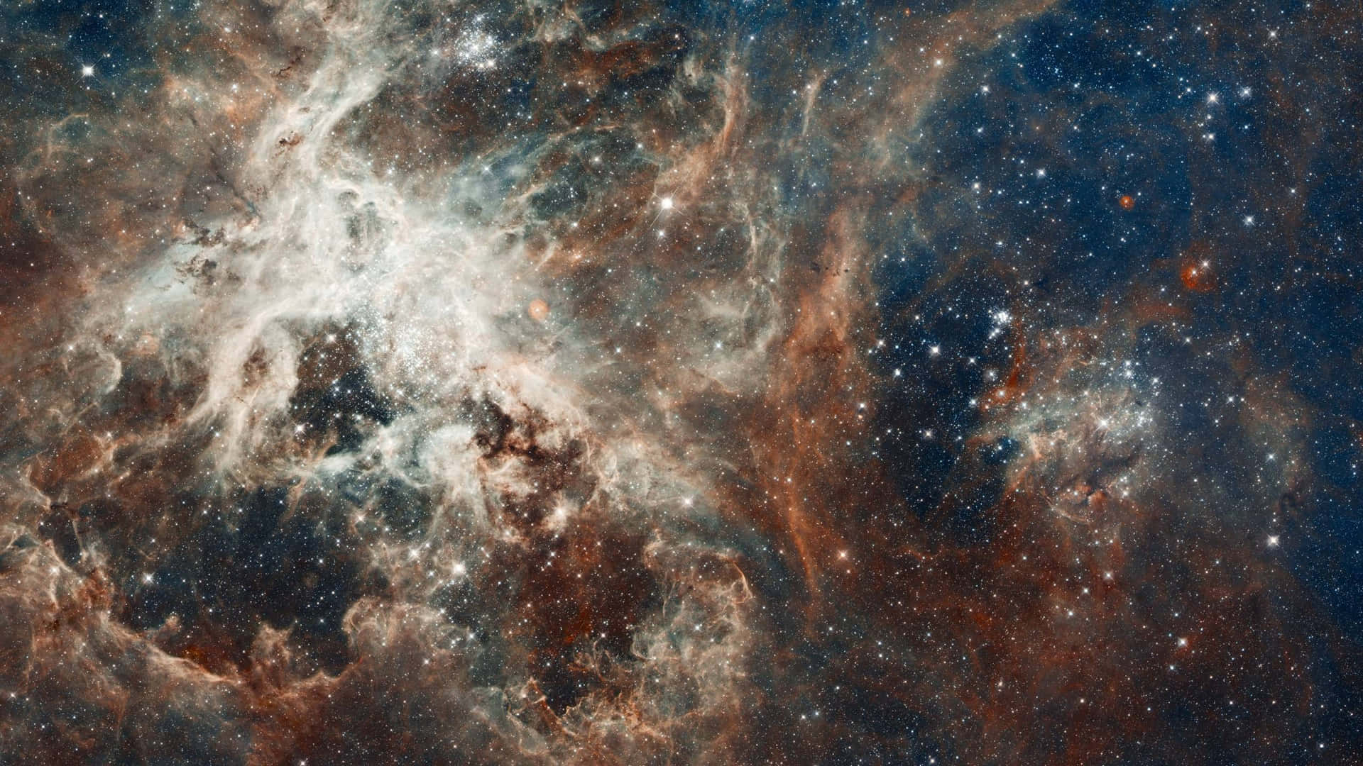 廣闊的宇宙星雲，在深空中擁有發光的氣體雲和無數星星。