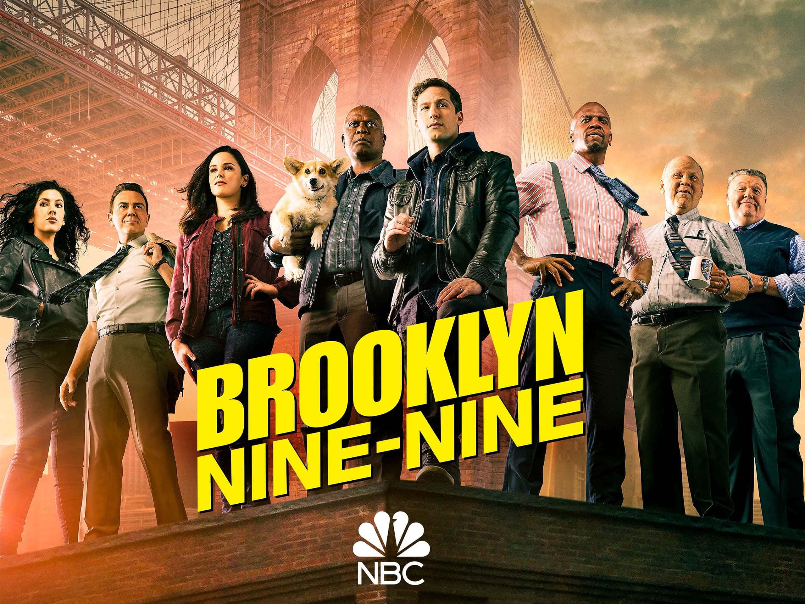 享受NBC《Brooklyn Nine-Nine》的幽默與古怪魅力！ 壁紙 — 《神煩警察》嘅演員自信地企喺日落時分嘅布魯克林大橋前面，拖住一隻哥基犬。