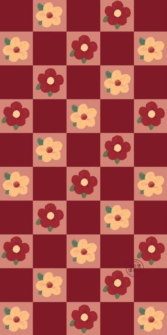 享受最新科技，擁抱可愛紅色iPhone 壁紙 — 紅與米色相間的棋盤格圖案，每個方格飾有紅與奶油色的風格化花朵。