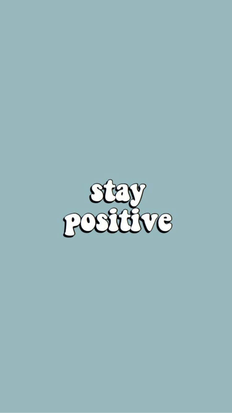 青色背景上帶有白色氣泡文字顯示 stay positive