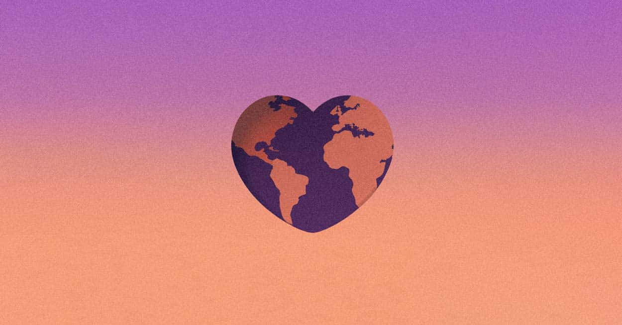 心形地球在紫色和桃色的天空前