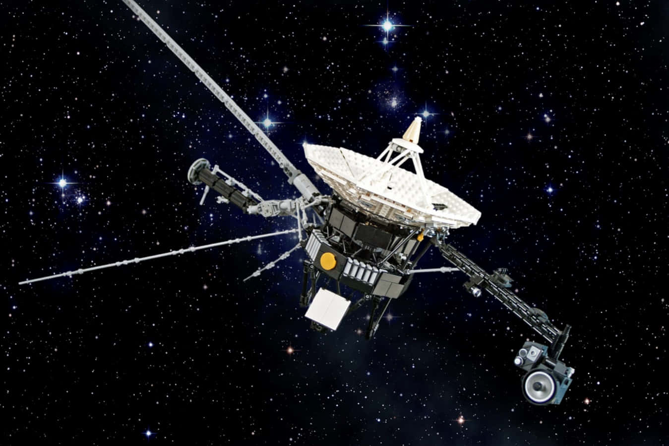 一艘太空船在閃爍的星星中漂浮於太空。