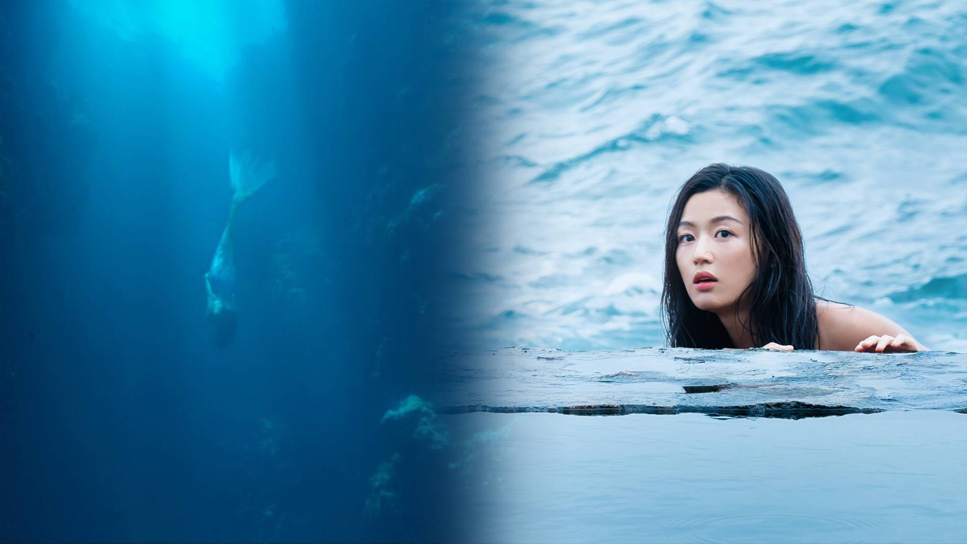 人魚 Jun Ji Hyun 壁紙 — 一名女性在波濤洶湧的海水中浮出水面，一條大鯊魚在她下方威脅性地游動。