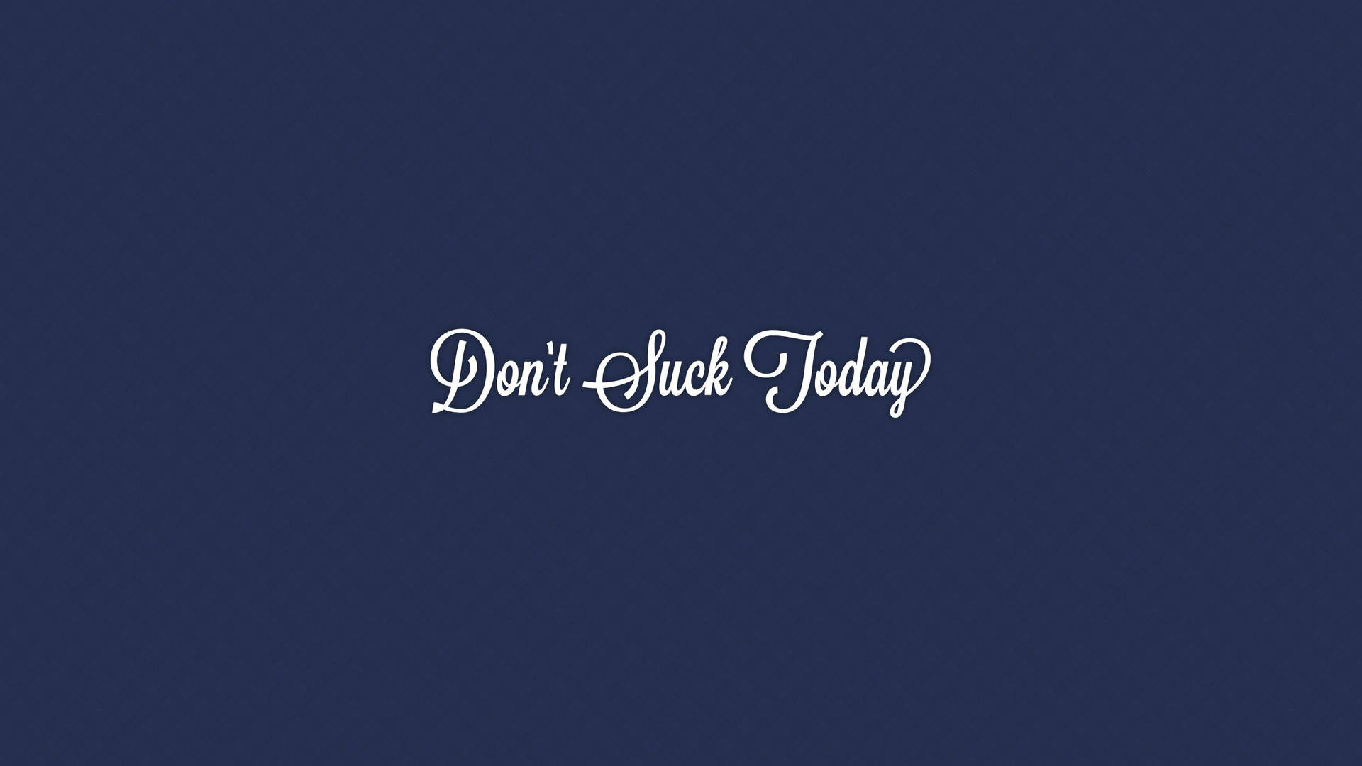 勵志語錄文字，在深藍色背景上以白色草書寫著「Don't Suck Today」。
