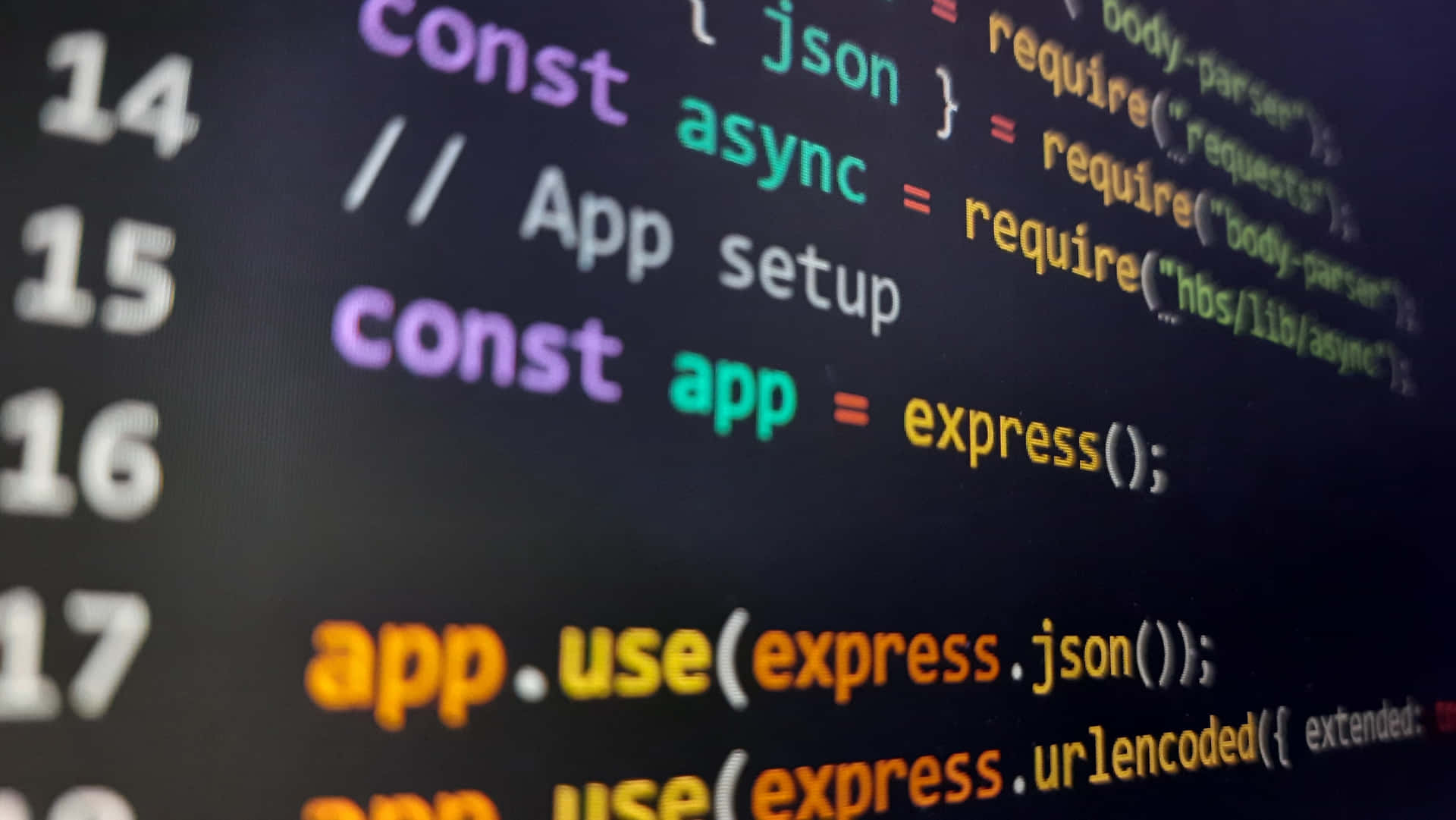 特寫JavaScript程式碼在深色螢幕上並帶有語法高亮。