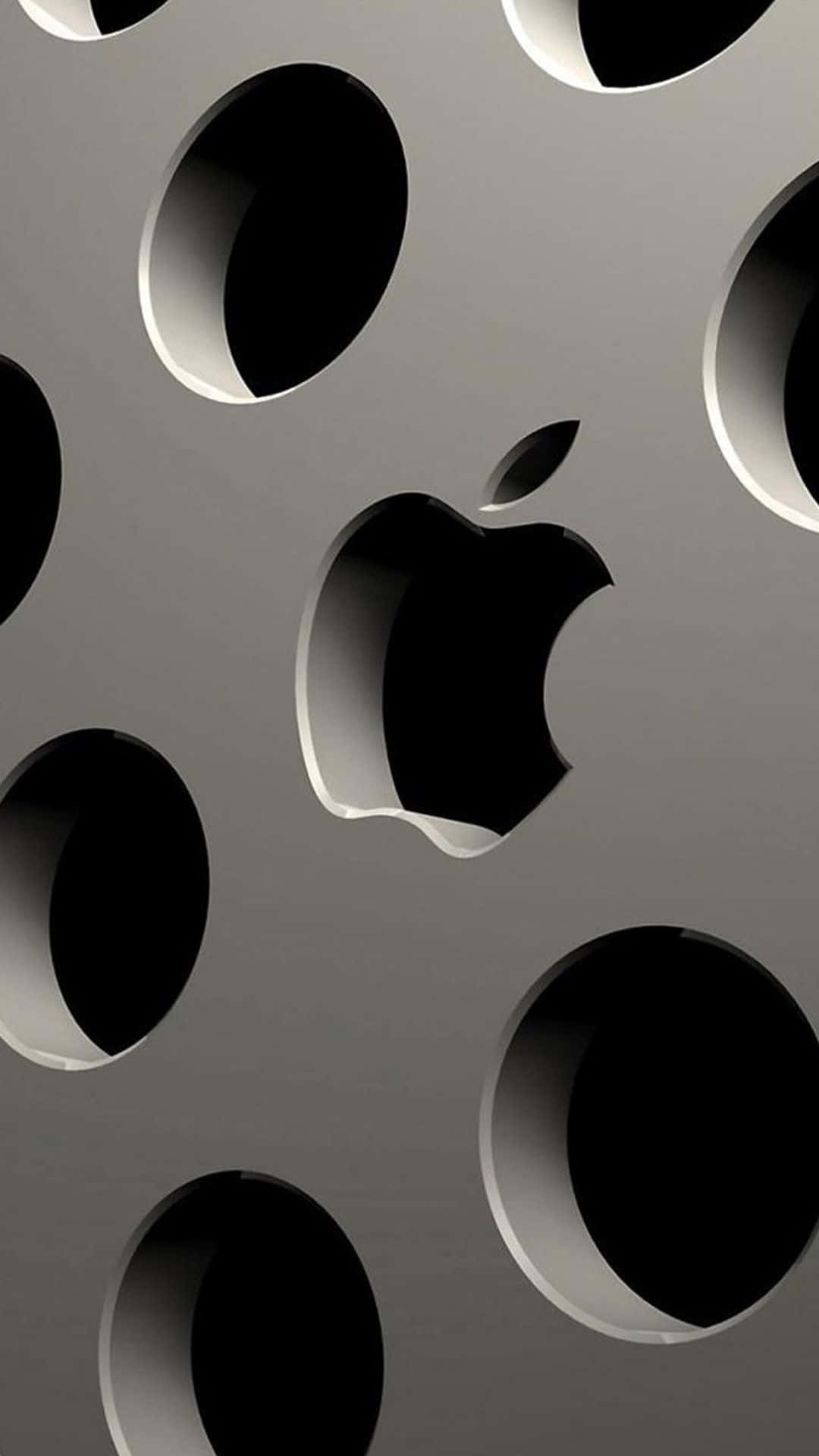 帶有圓孔和Apple標誌鏤空的金屬表面。