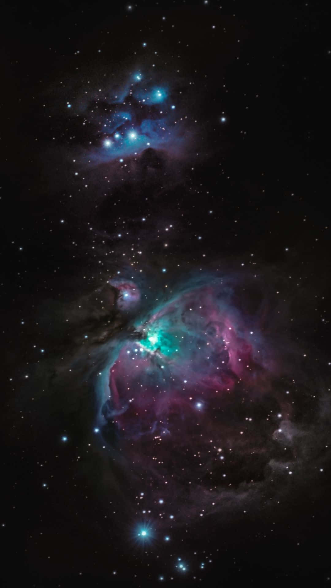 星雲 桌布 壁紙 — 令人嘆為觀止的宇宙星雲景觀，在繁星點點的黑色虛空中閃耀著鮮豔的藍色和粉紅色光芒。
