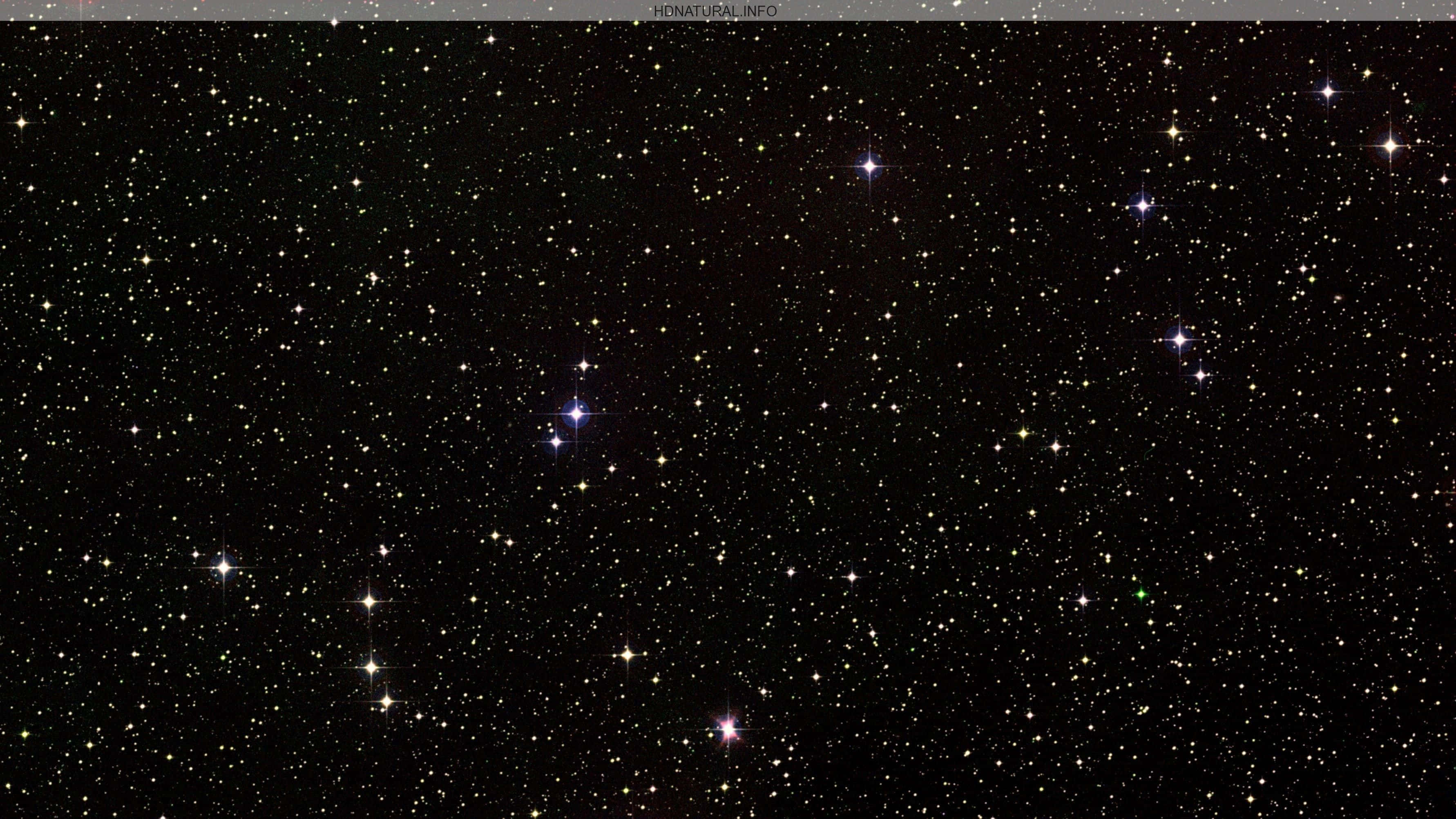 Galaxy Stars 桌布 壁紙 — 令人嘆為觀止的星空夜景，無數閃爍的星星點綴在深邃的黑色虛空中。