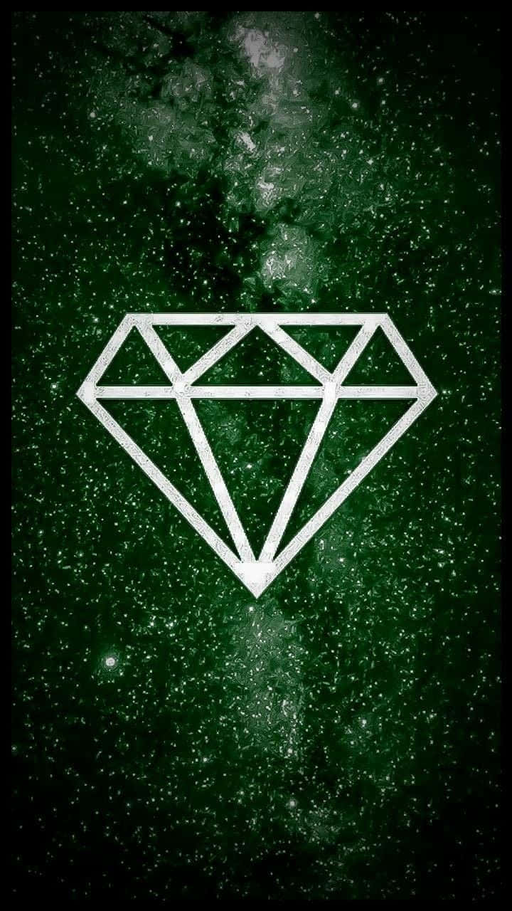一個白色鑽石輪廓在綠色星空夜空背景下。