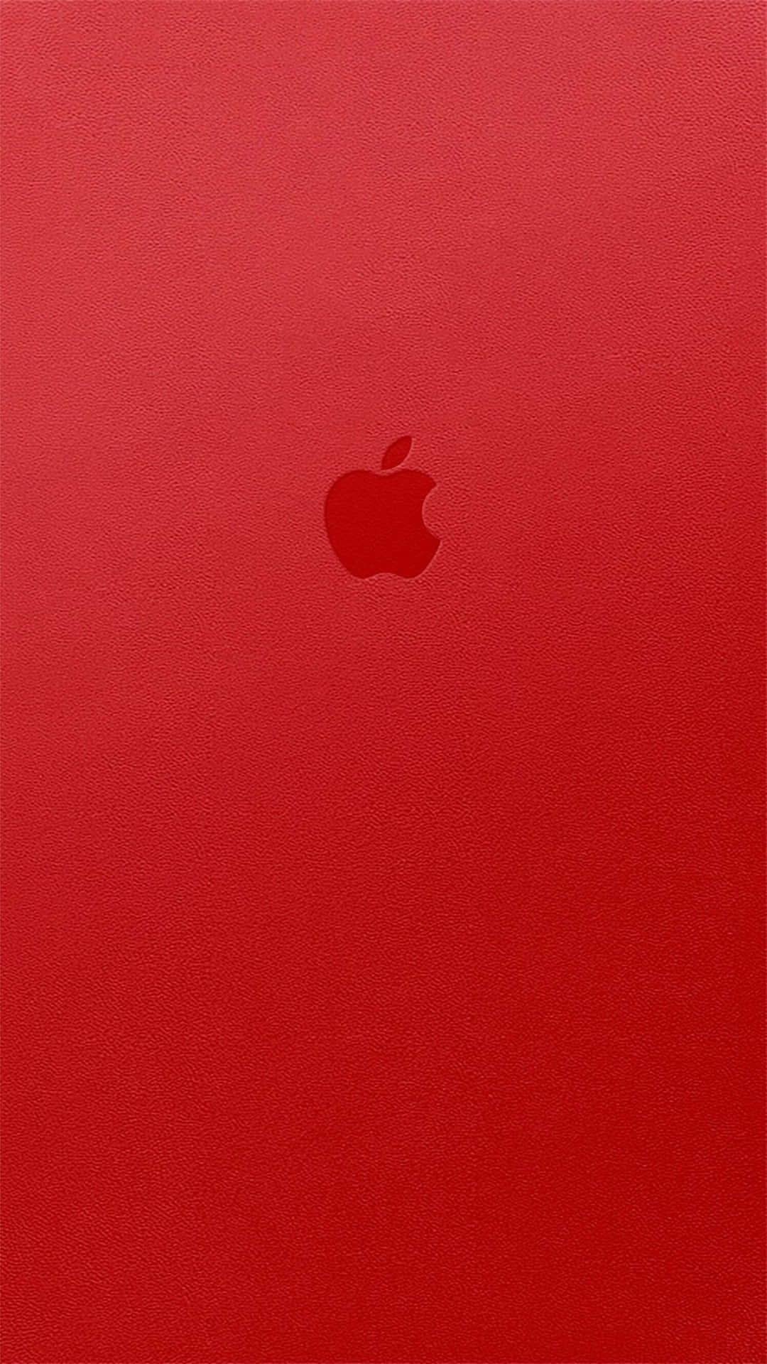 紅色皮革紋理背景，中央帶有Apple標誌。