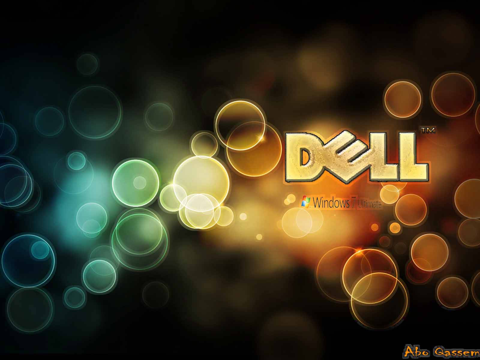 令人驚嘆的戴爾 HD 壁紙 — 金色Dell標誌在深色漸變背景上，於彩色散景圓圈中閃耀。