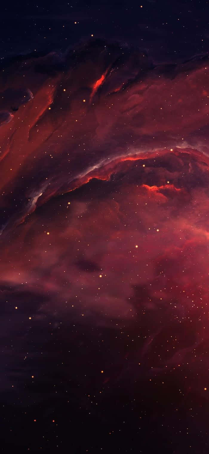在深空中散佈著星星的鮮豔紅色和紫色星雲。