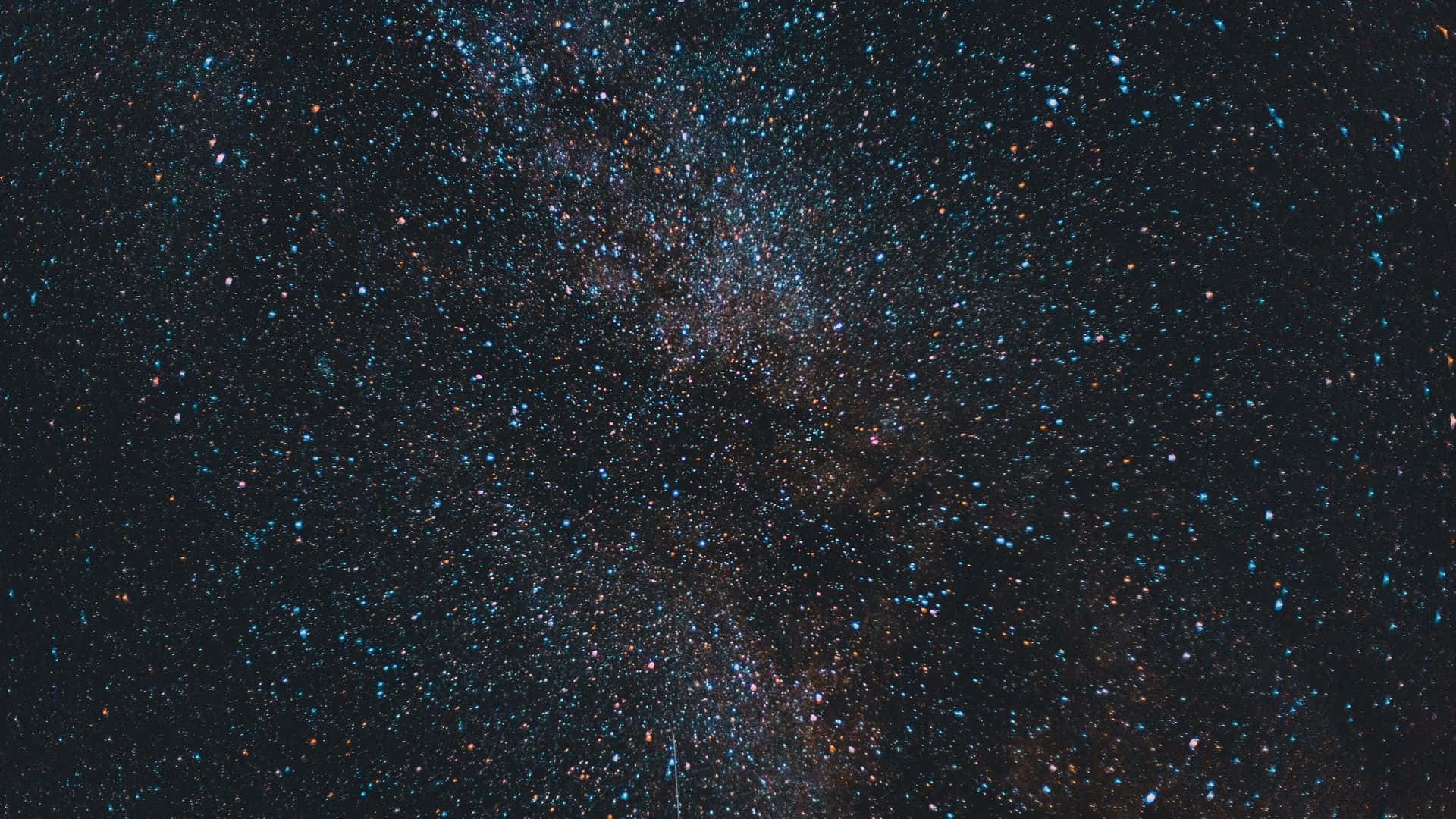 Galaxy Stars 桌布 壁紙 — 令人驚嘆的銀河系景觀，在深邃的黑色天空中閃爍著無數恆星和宇宙塵埃。