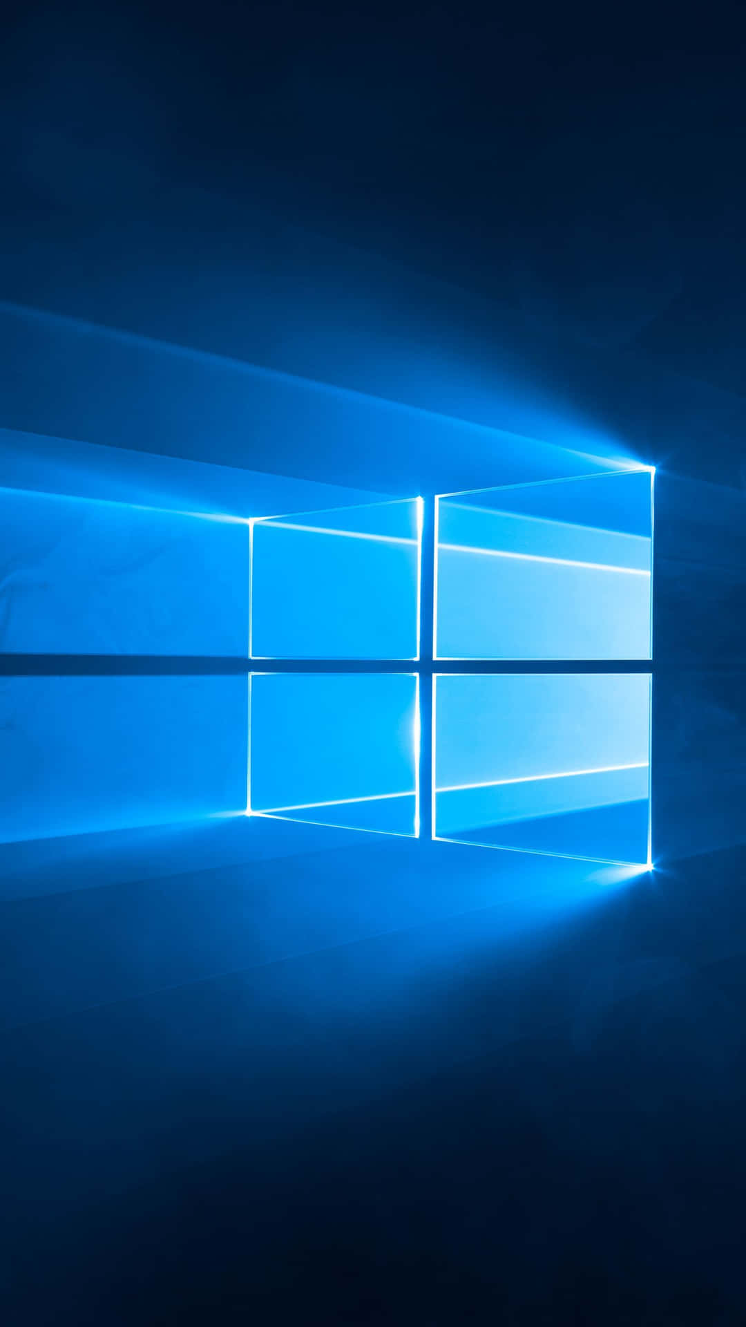 一個發光的藍色Windows標誌在黑暗空間中散發光芒。
