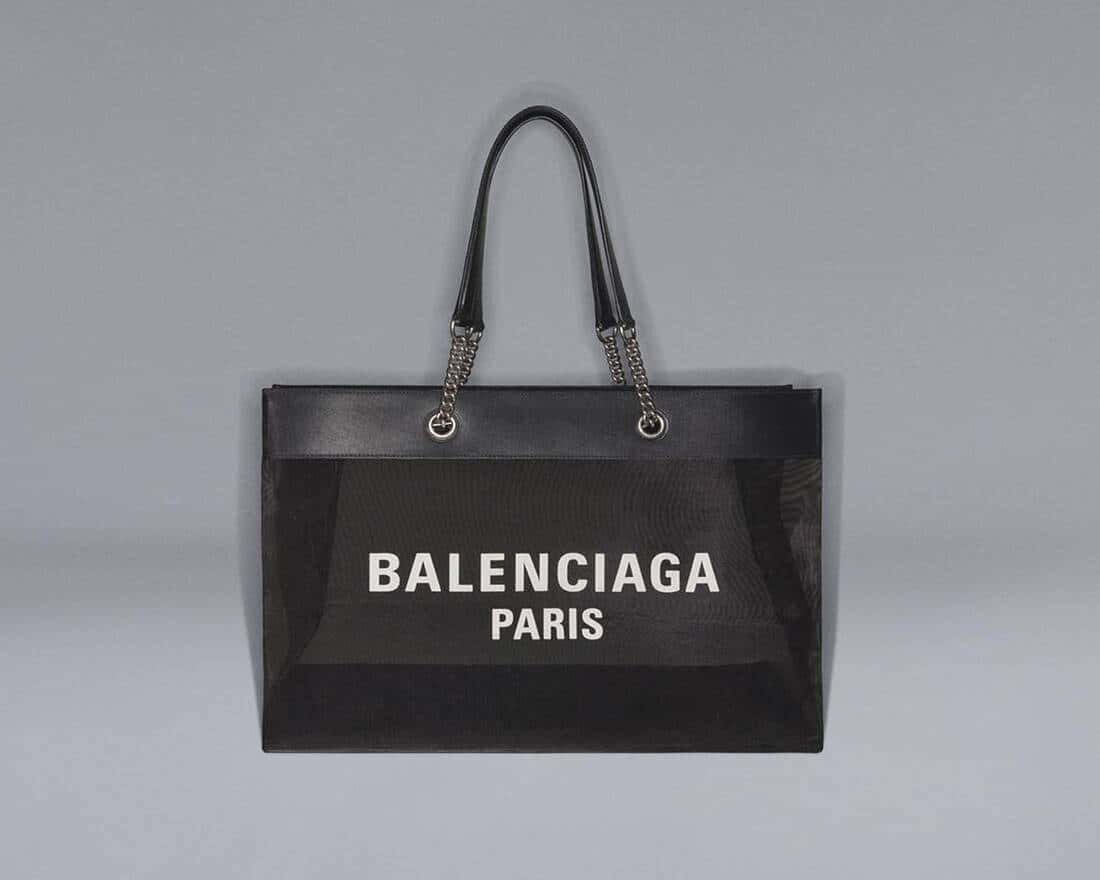 黑色Balenciaga Paris手提袋，正面網眼設計，鏈條手柄。