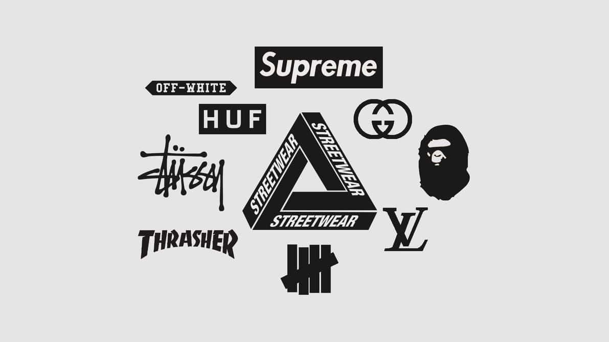 以 Hypebeast 展現你的大膽風格 壁紙 — 以淺灰色背景上的黑色呈現的標誌性街頭服飾和奢侈品牌標誌的極簡系列。
