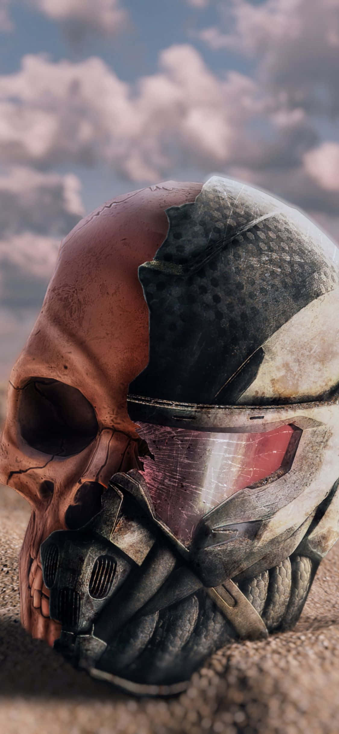 以 iPhone X 與 Crysis 3 搏鬥奪勝 壁紙 — 一個風化的頭骨半埋在沙中，上面放著一個破裂的未來主義頭盔，背景是陰天。