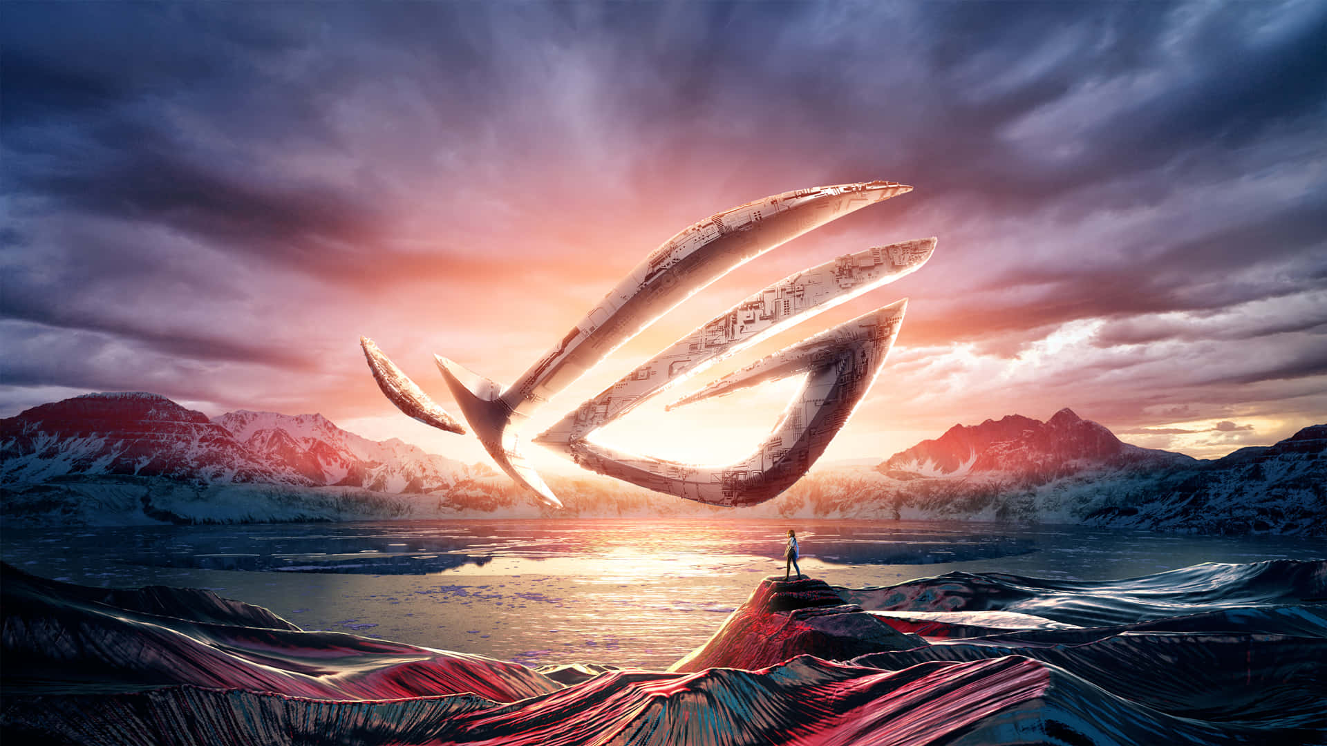 以 ROG 感受遊戲的極致體驗 壁紙 — 一個孤獨的身影站在岩石露頭上，凝視著一個巨大的發光ROG標誌，懸浮在日落時分白雪皚皚的山湖之上。