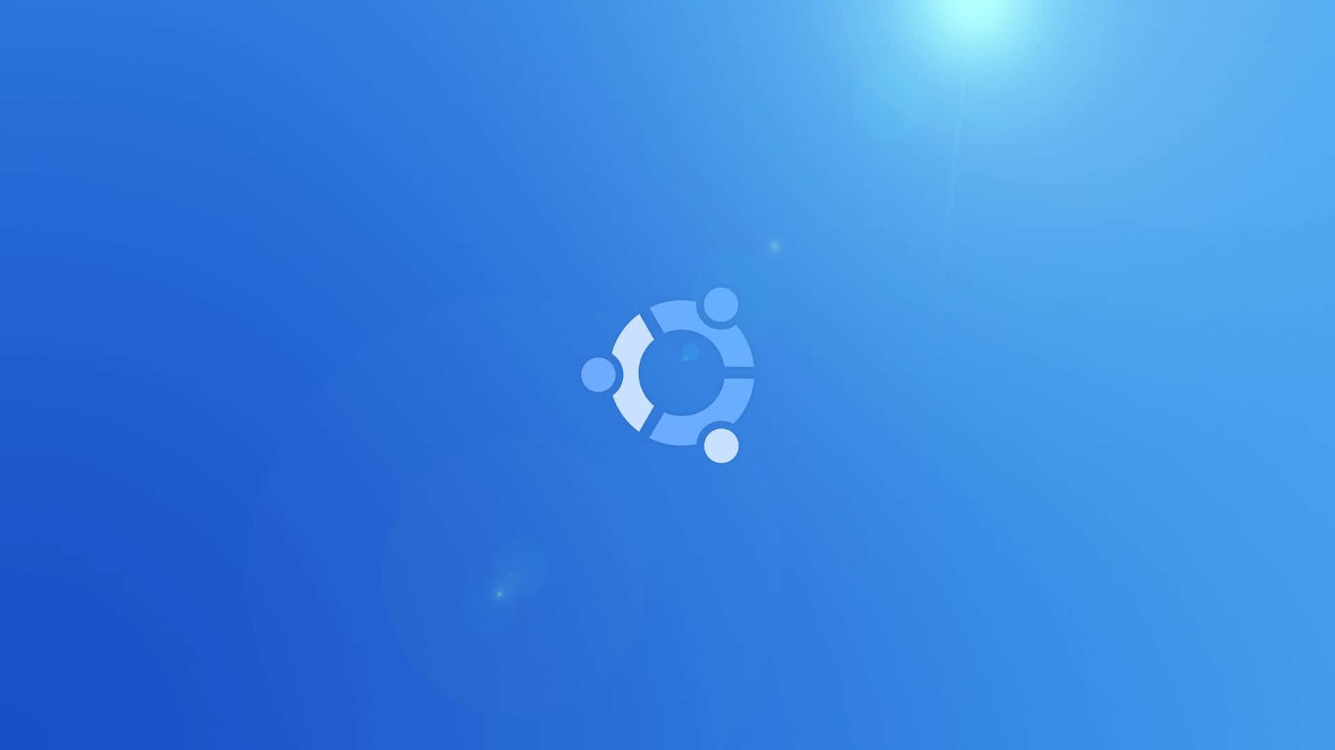 Ubuntu 標誌在漸變藍色背景上帶有鏡頭光暈