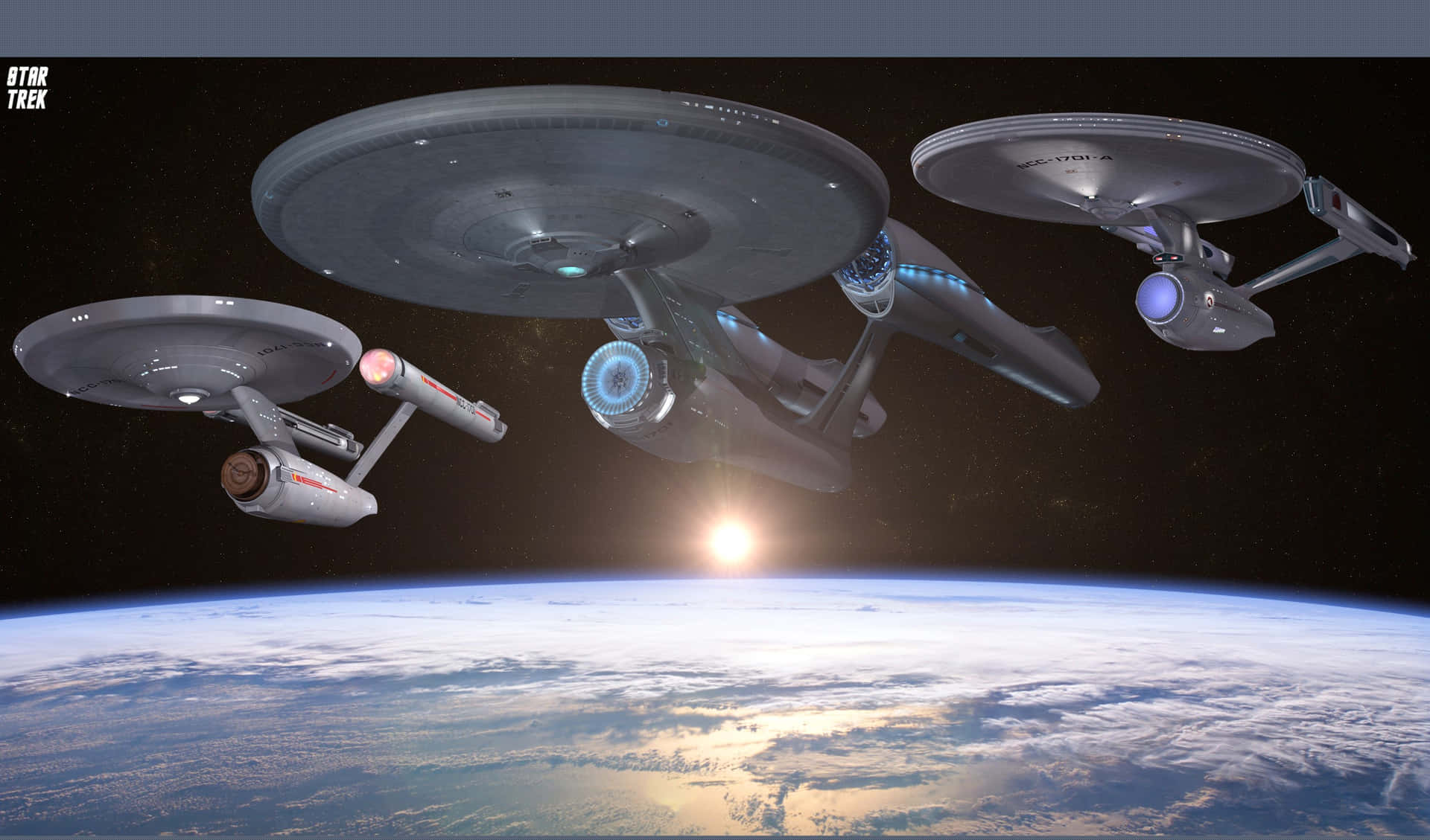 三艘星際迷航星艦在日落時飛越行星。
