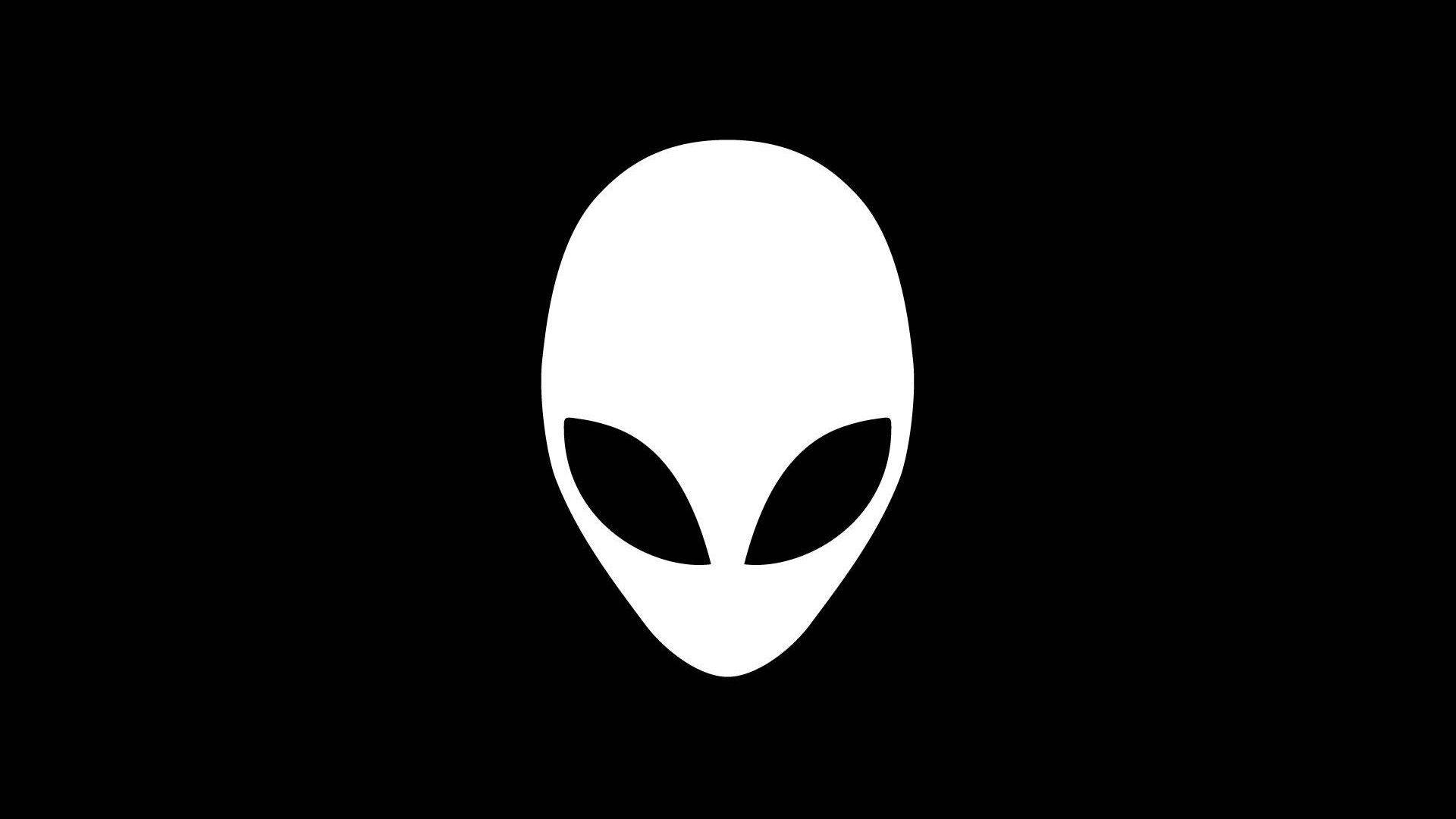 黑色背景上帶有大黑眼睛的白色外星人頭像圖標