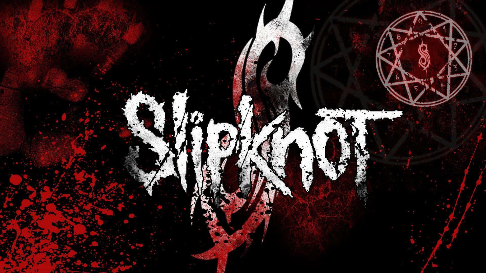 以Slipknot桌面壁紙為您的工作空間設置舞台 壁紙 — Slipknot 樂隊標誌在黑色背景上濺上紅色油漆，並帶有神秘符號。