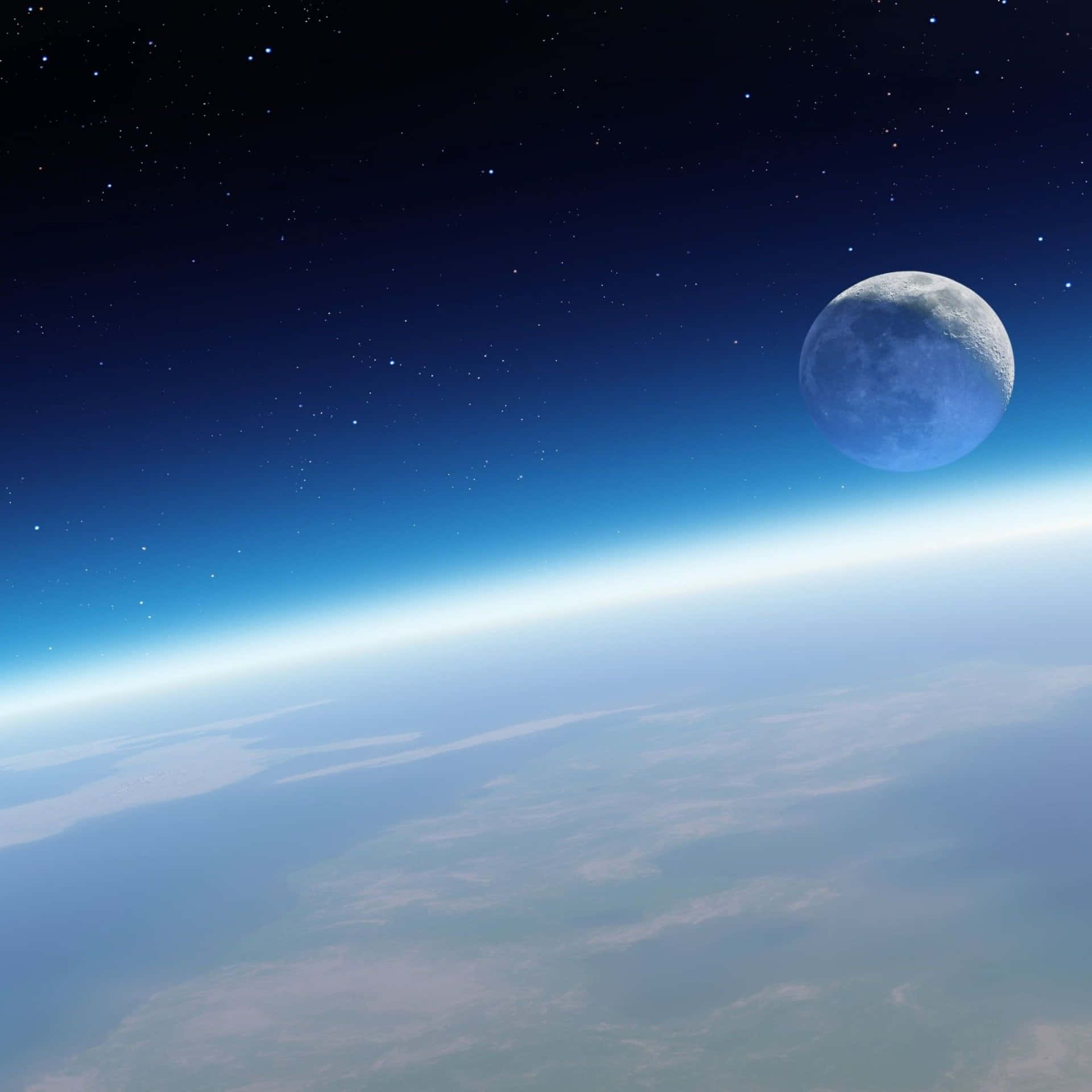 藍色月亮在繁星點點的夜空襯托下，從地球彎曲的地平線升起。