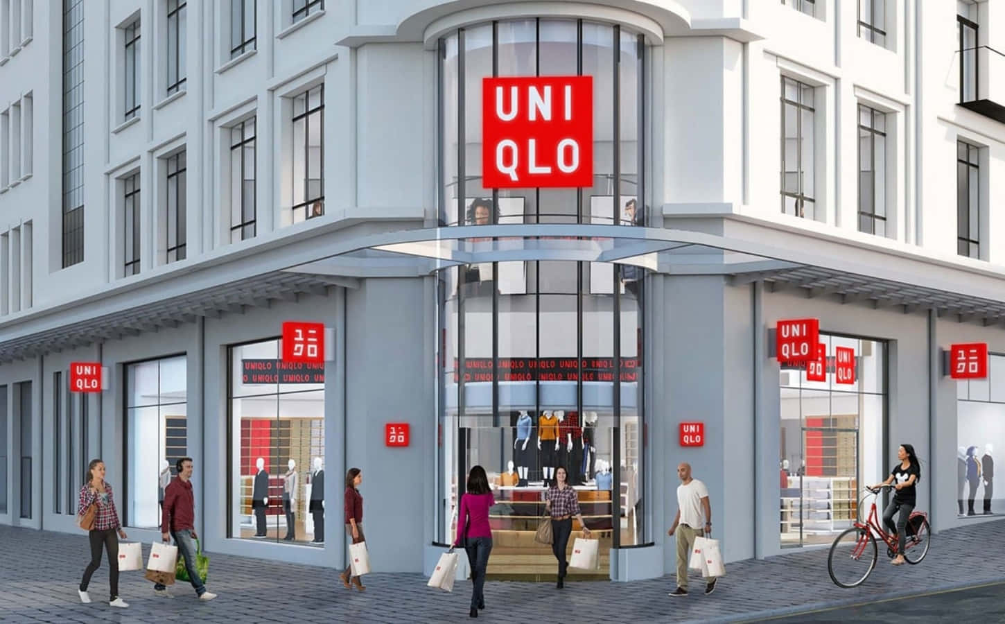 人們走過帶有紅色標誌和玻璃窗的 Uniqlo 服裝店。