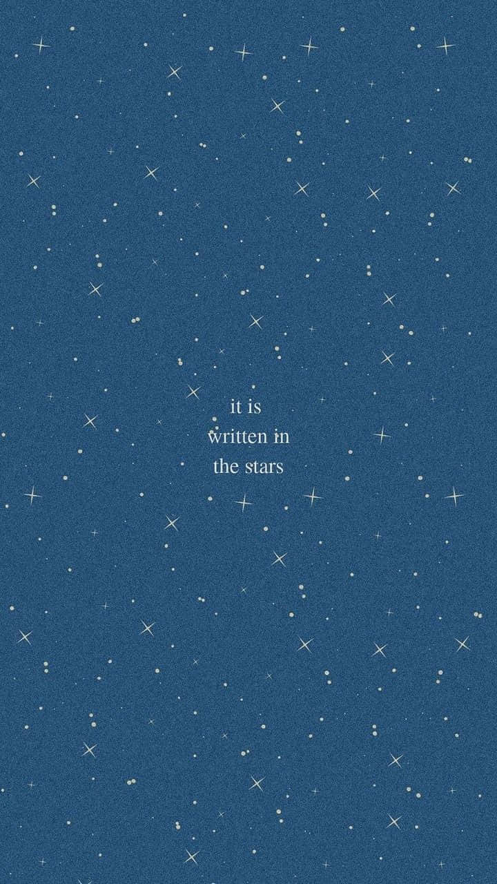 深藍色星空，白色文字 it is written in the stars。