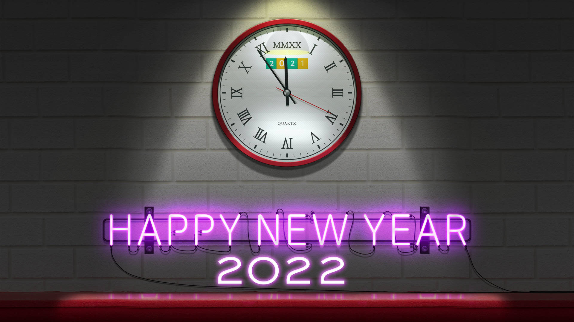 霓虹燈標誌在磚牆上的聚光燈下寫著新年快樂2022。