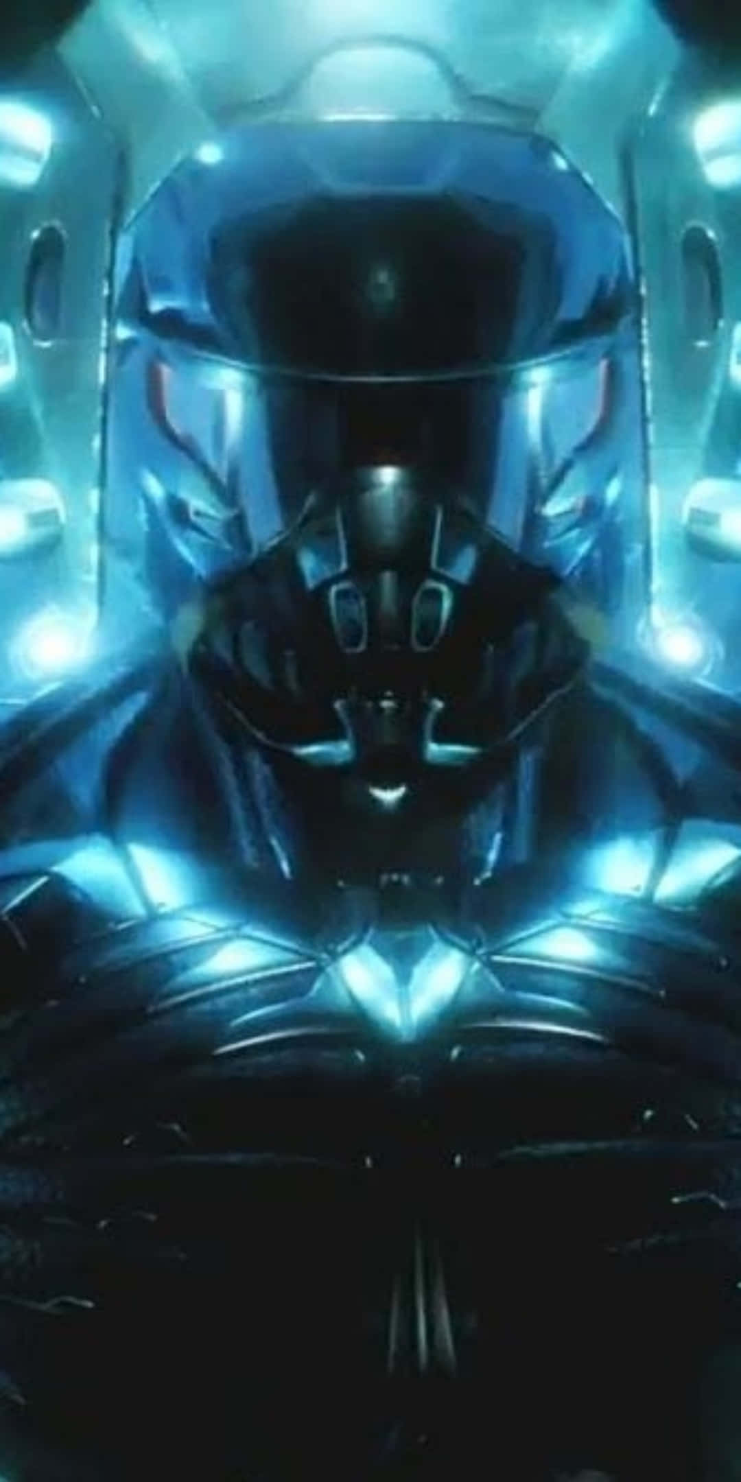 以強大 Pixel 3 與 Crysis 3 稱霸遊戲體驗 壁紙 — 一個未來風格的裝甲人物，帶有發光的藍色燈光，戴著頭盔，站在高科技房間中，氣勢逼人。
